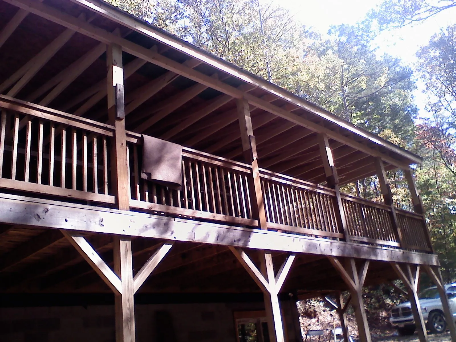 Timber framing under a new elevated porch and deck — Roof Leak Repair in Woodman by Roofing Brothers